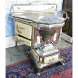 Belgian Corner Stove Baked enamel. Face in front. Floral design. 3  burners. Approx. 38 1/2" H x 45"