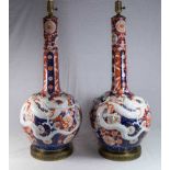 Pair Japanese Imari Bottle Vases with Dragons Mounted as lamps. Vases approx. 32" H.