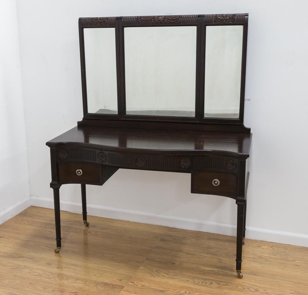 Mahogany Adam Style Carved Vanity With trifold mirror.