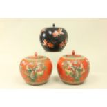 3 Chinese Porcelain Ginger Jars Approx 9 1/2" H. 2 orange ground, 1 black ground.