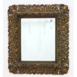 19th Century Carved Gilded Wood Beveled Mirror Approx. 33 1/2" H x 29 1/2" W.