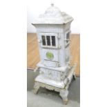 Victorian Stove Painted white. Approx. 43" H x 16" W x 18" D.  Crack in base. Crack in base.