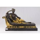 Bronze Sculpture of Reclining Cleopatra Mounted on marble base with gold highlights.  Approx. 14"