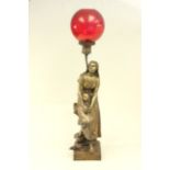 19th Century Bronze Figural Lamp Signed E. Lauren. With ruby red shade. Approx. 40"  H. Figure 27"