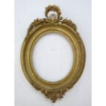 19th Century Oval Giltwood Frame Approx. 39" H x 29" W. Repair throughout. Repair throughout.