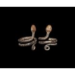 Egyptian Silver Coiled Snake Ring Roman Period, 30 BC-323 AD. A cast D-section coiled band with