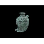 Islamic Bronze Ink Vessel 12th century AD. A hollow-cast leaf-shaped bulbous vessel with knop