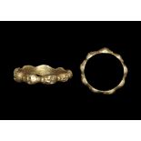 Medieval Silver-Gilt Ring with Skulls 16th century AD. A hoop formed as nine skulls with impressed