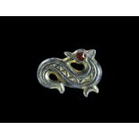 Frankish Silver-Gilt and Garnet Hippocampus Brooch 6th century AD. A cast plate brooch of a