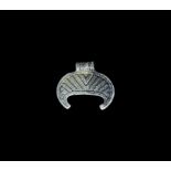 Viking Silver-Gilt Filigree Lunate Pendant 8th century AD. A crescentic plaque with ribbed loop