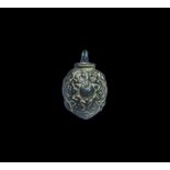 Viking Gilt-Bronze Pendant 8th-12th century AD. A slightly domed discoid plaque with enmeshed