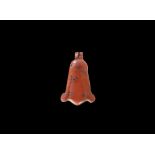 Egyptian Red Jasper Lotus Amulet Late Period, 664-332 BC. A carved pendant of a lotus flower,