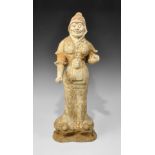Chinese Ceramic Lokapala Guardian Figurine Tang Dynasty, 618-906 AD. A hollow-cast Lokapala figurine