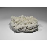 Geological Aragonite Mineral Specimen A sheet of finely crystallised aragonite on massive, layered