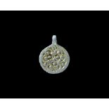 Viking Silver-Gilt Trefoil Disc Pendant 10th-12th century AD. A discoid pendant with integral