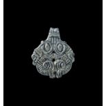 Viking Silver-Gilt Pendant with Enmeshed Beasts 8th-10th century AD. A cast pendant with integral