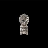 Post Medieval Silver Hinged Pendant 16th century AD. A hollow-cast discoid finial with facing female