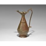 Islamic Abassid Bronze Ewer 17th-18th century AD. A sheet-bronze fabricated ewer with piriform body,