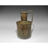 Islamic Khorasan Bronze Calligraphic Ewer 12th-13th century AD. A drum-shaped vessel with deep