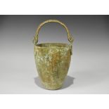 Greek Bronze Situla 4th-3rd century BC. A cast flat-bottomed vessel with separate loops and