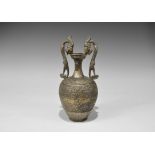 Chinese Silver-Gilt Dragon Vase Tang Dynasty, 618-906 AD. A cast silver vase with bulbous body,