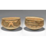 "3300-1700 BC. A squat terracotta cup with flared rim, painted pair of opposed birds and a fish. 111