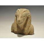 "20th century AD. A ceramic head of Soker with antelope features, tripartite wig, socket to the