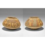 "3300-1700 BC. A squat terracotta jar with chamfered rim, polychrome birds to the shoulder. 222