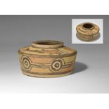 "3300-1700 BC. A squat terracotta jar with deep shoulder and raised rim, polychrome fish to the