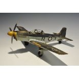 "20th century AD. A good quality retro 'tinplate' model of a P51 Mustang fighter plane from the