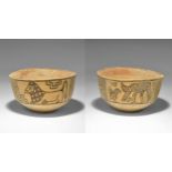 "3300-1700 BC. A terracotta carinated cup with polychrome panels of geometric ornament, birds and