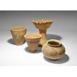 "3300-1700 BC. A mixed group of terracotta vessels comprising: a goblet with carinated bowl,