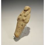 . An undated archaistic terracotta shabti in Late Period, 664-332 BC style, with tripartite wig,