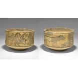 "3300-1700 BC. A terracotta cup with painted polychrome geometric panels, advancing griffin and