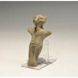 "5th-4th millennium BC. A terracotta figurine with pinched facial features, stub arms and