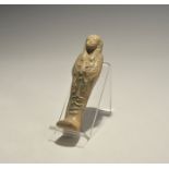 "20th century AD. An olive green glazed composition shabti with winged scarab to the chest, wedjat