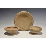 "3300-1700 BC. A mixed group of terracotta vessels comprising: a broad dish with frieze of