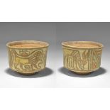 "3300-1700 BC. A terracotta cup with slightly waisted sidewall, polychrome geometric panels with a