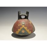 "20th century AD. A ceramic blackware vessel with domed underside, four polychrome stepped figures