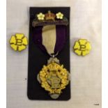 A Primrose League medal with Special Service 1901 clasp and two Primrose League badges