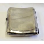 A silver cigarette case Birmingham 1912 90gms