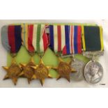 A mounted WW2 medal group of six including Africa Italy France & Germany Stars and Territorial Medal