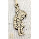An extremely rare silver charm depicticting Adolf Hitler hanging from a noose