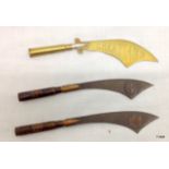 Three scimitar shaped trench art paper knives with bullet handles the longest being 18 cms long with