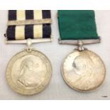 An unnamed Queen Victoria Volunteer Long Service Medal and an unnamed Service Medal of the Order