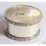 A silver napkin ring