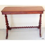 A Victorian mahogany side table with barley twist cross stretchers 74h x 103l x 41d