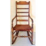An antique elm Windsor rocking chair height 106
