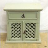 A vintage painted single drawer cabinet with lattice work door 60h x 61w x 42d