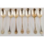 A set of 7 silver dessert spoons 347gms